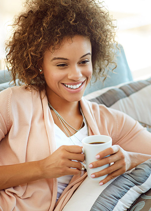 Young_Woman_Relaxing_In_Warm_Home_Best1_Plumbing_and_Heating